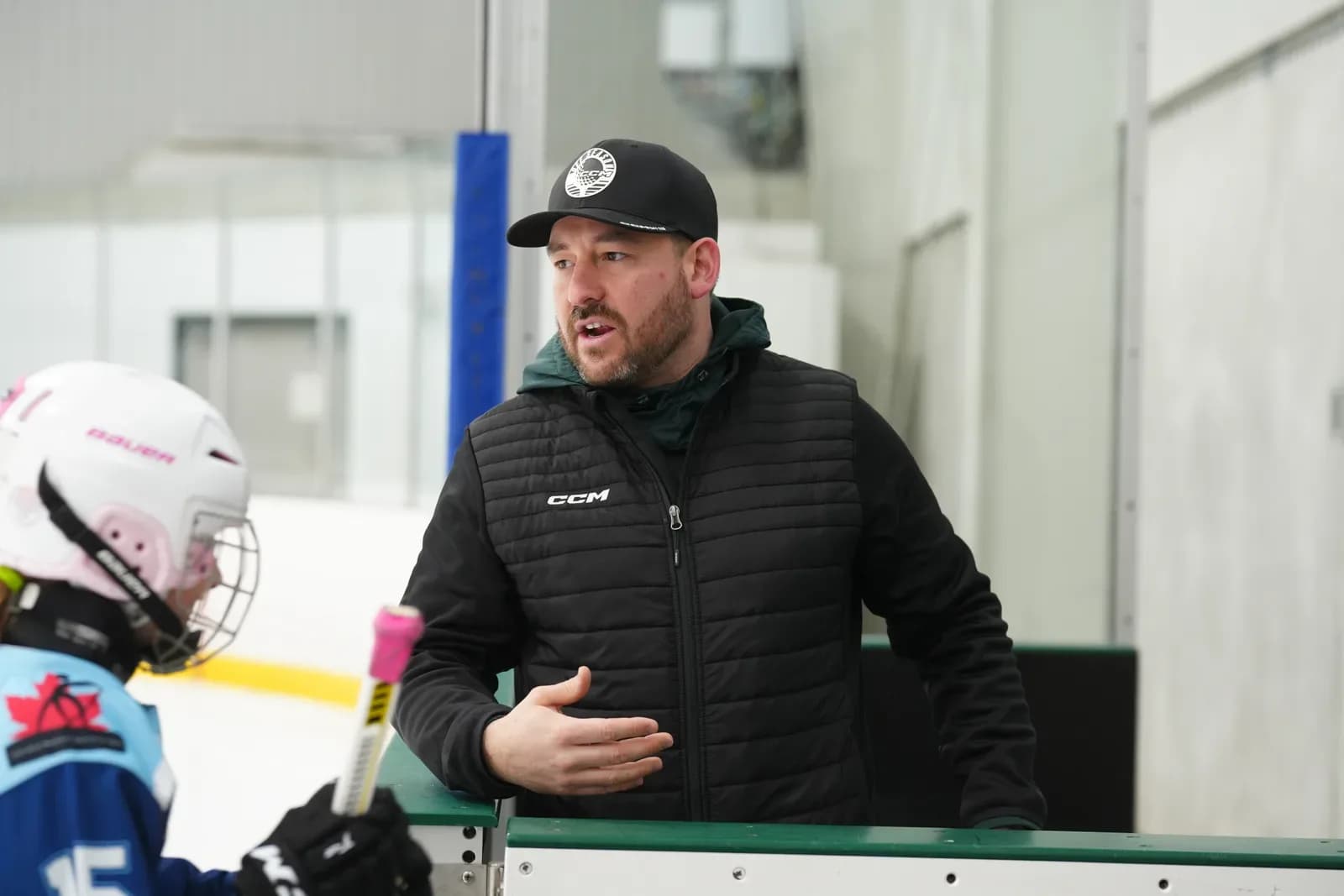 Guelph Giants coach with athletes at practice